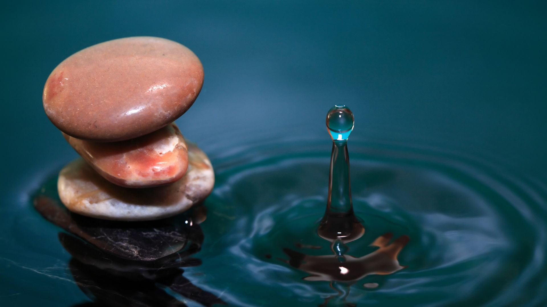 A drop in the water and stacked stones