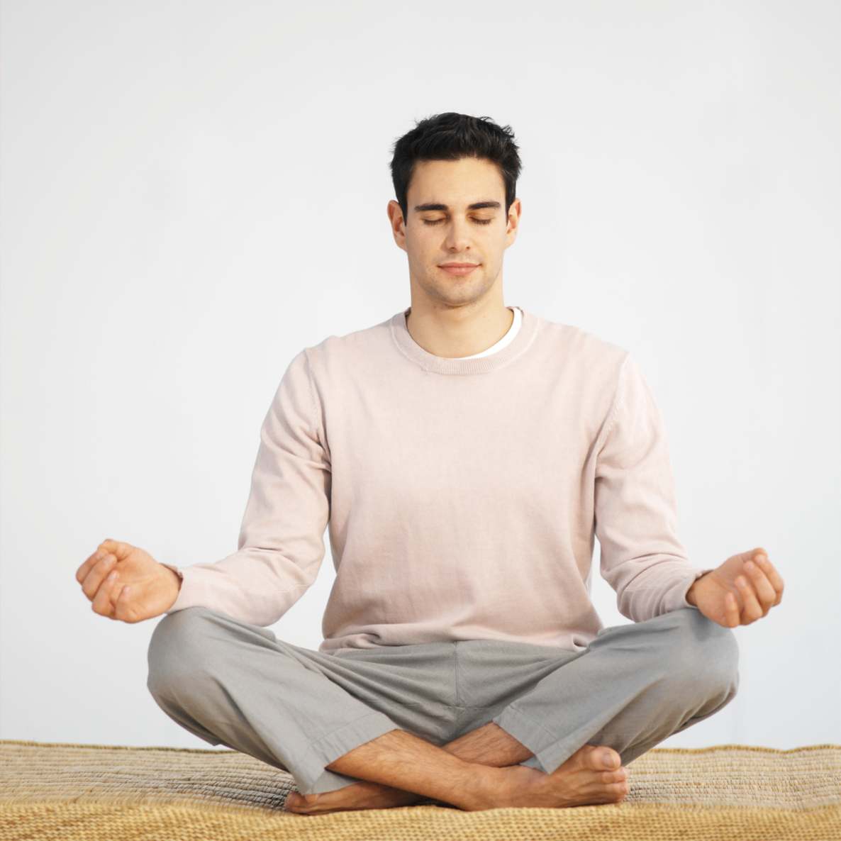 About us demonstrated by a male meditating