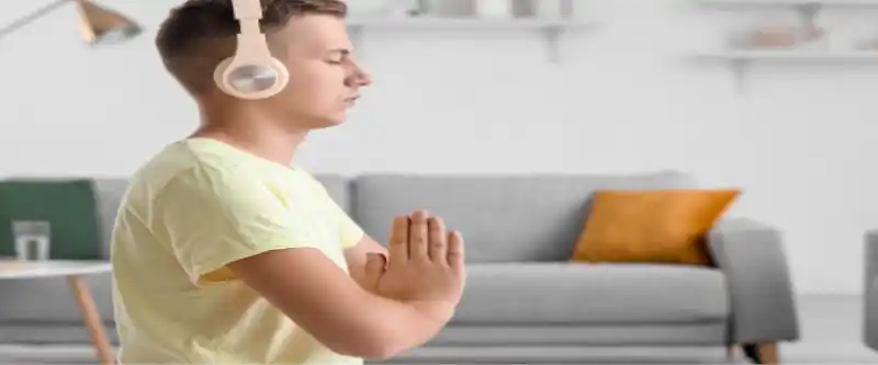 Meditating with headphones to activate the power of a positive mindset. Meditation can empower you and a positive mindset is essential for day to day living. Find out more @ i-am-meditations.com